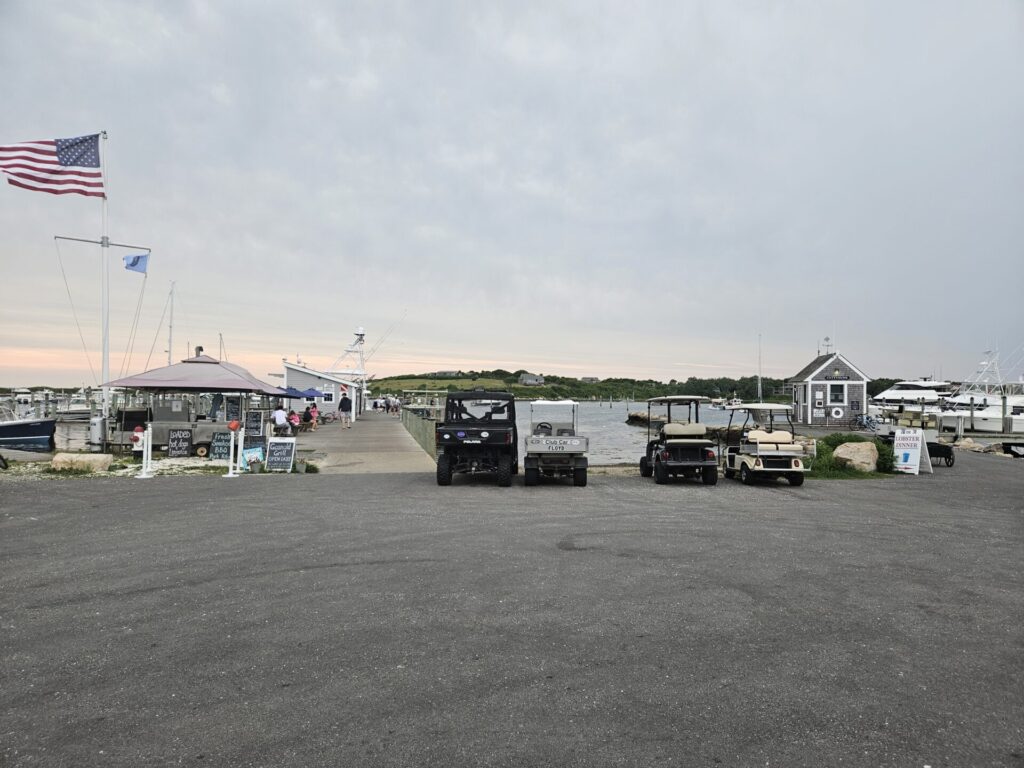 cuttyhunk-fishing-dock Image of golf carts parked in front of the Cuttyhunk Fishing dock